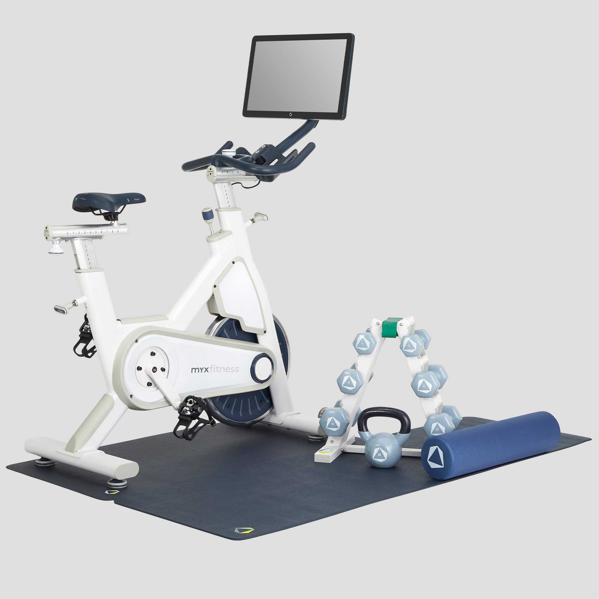 The MYX II Plus Home Studio in Natural White with weight rack, foam roller, spri stretch band, kettlebell and floor mats