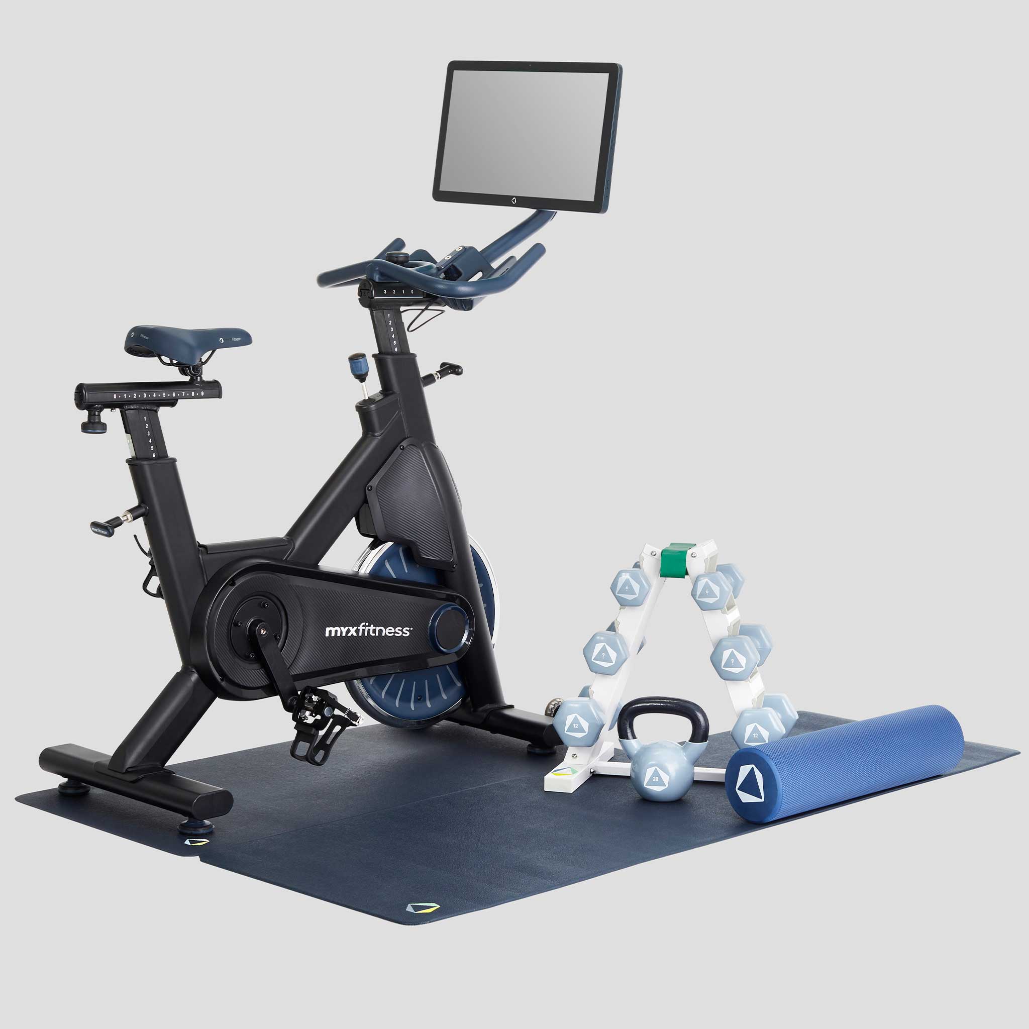 The MYX II Plus Home Studio in Charcoal black with weight rack, foam roller, spri stretch band, kettlebell and floor mats